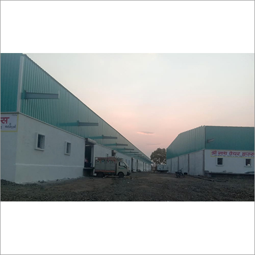 Industrial PEB Warehouse Building - Steel Structure, Grey-White Finish | Ideal for Warehouse Use and Durable Design