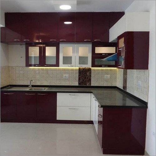 Modular Kitchen Interior Design - L-Shaped, Wooden Construction with Burgundy Finish, Granite Countertop, Stainless Steel Hardware, LED Lighting