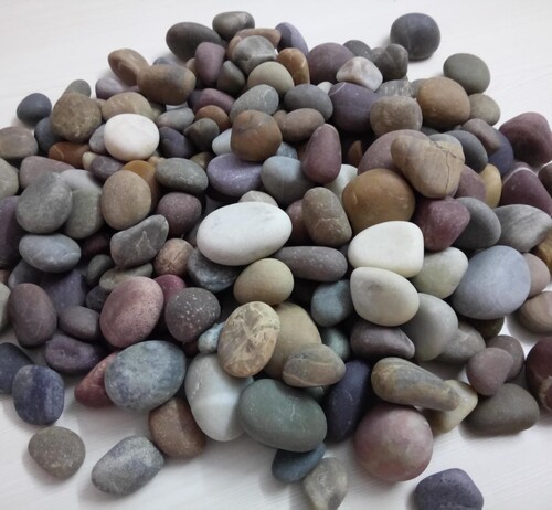 Mix colored natural river pebbles for exterior and garden decoration
