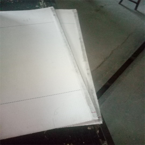 Corrugator traction belt
