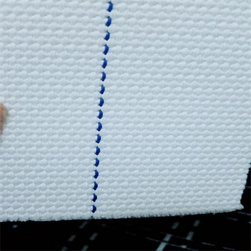Corrugator traction belt