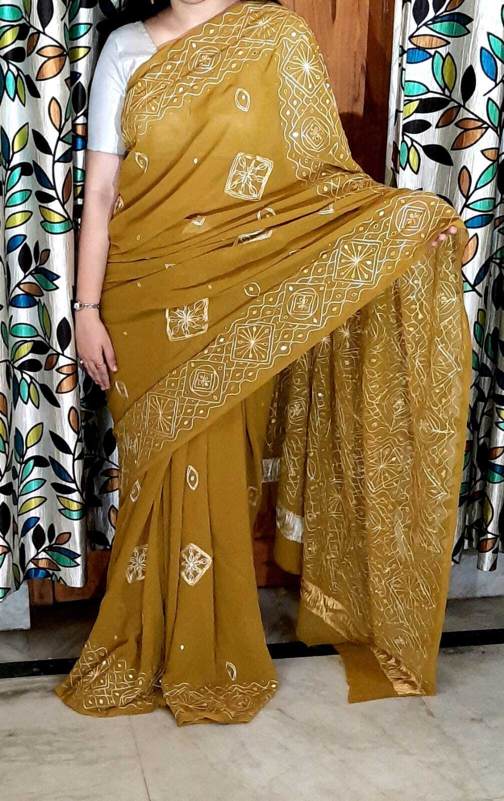 Hand Ari and mirror work on pure chiffon saree