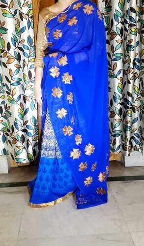 Applique work on blue chiffon saree