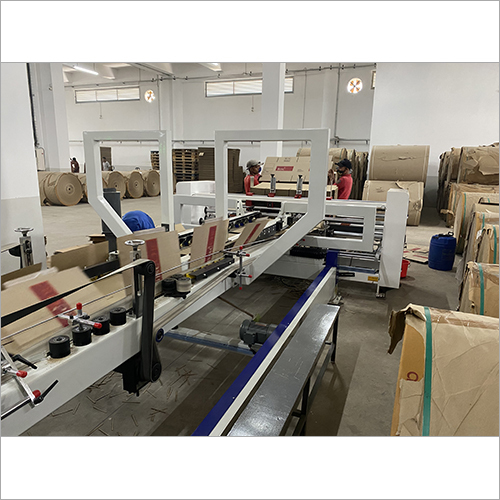 Corrugated Carton Making Line Packaging Services By ULTRA WORLDWIDE PVT. LTD.