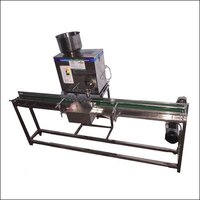 Camphor Weighing  Bottle Filling Machine