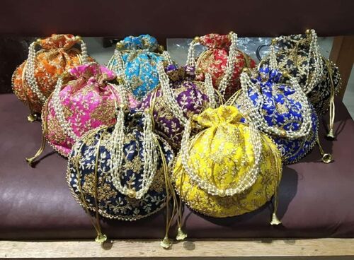 Magenta potli bags