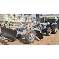 Grey New Holland Tractor Grader