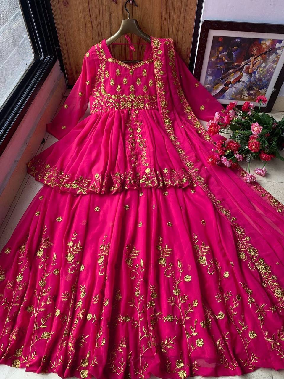 Women Embroidered Georgotte Salwar Suit...