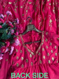 Women Embroidered Georgotte Salwar Suit...