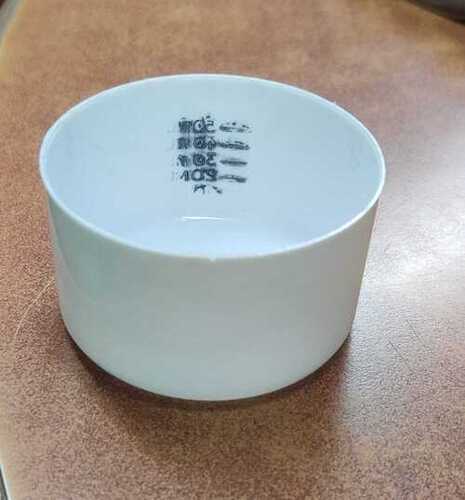 Milky plastic measuring cup