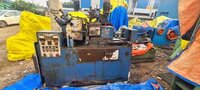 CENTRELESS GRINDING MACHINE