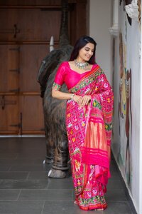 Women pure Gaji Silk material with lagadi patta and Patola print design Saree