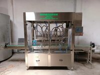 AUTOMATIC SERVO BASED FILLING MACHINE