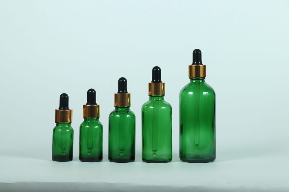 15ml Green Lotion Pump Bottle - Glass Material Round Shape Available in Various Sizes | Features Pump Sprayer for Easy Dispensing