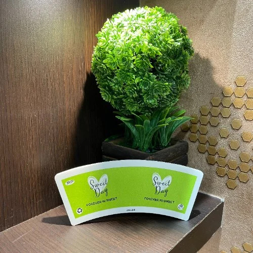 Paper Cup Blanks - 140 GSM ITC Food Grade Paper | Customized Sizes, White with Green and Black Print, PE Coated, Eco-Friendly, Compatible with Automatic Machines