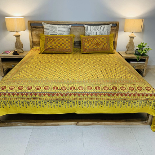 Yellow Printed Bed Sheet With Two Pillow Covers