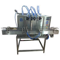 Automatic Four Head Engine Oil Filling Machine - Metal Build | Automatic Operation, Human Machine Interface, Lower Energy Consumption