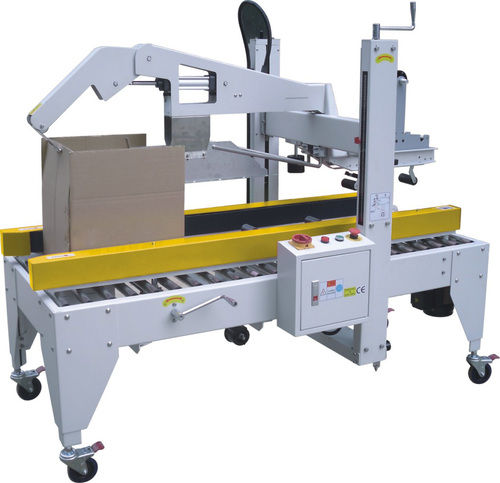 Automatic carton sealing machine