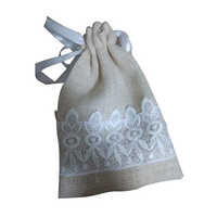 7x3 Inch Jute Drawstring Bag - Jute Material, 7x3 Inch Size, Light Brown Color | Smooth Drawstring, Embroidered Pattern, Ideal For Shopping
