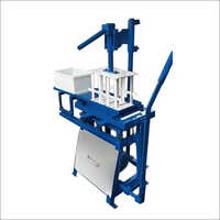 नीली ईंट बनाने की मशीन