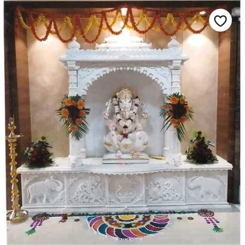 Carved marble mandir with Ganesha statue