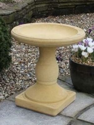 Sand stone bird bath