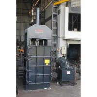 Black Semi Automatic Jadi Buti Baling Machine