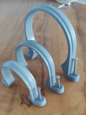 2.5 Inch PVC Pipe Fitting Clamp - Plastic Material, Grey Color, 25 Grams Weight | Ideal for Efficient Drainage Solutions