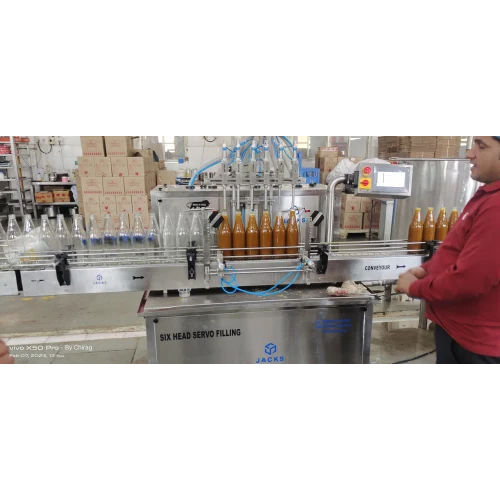 Automatic six head Servo based liquid Filling Machine