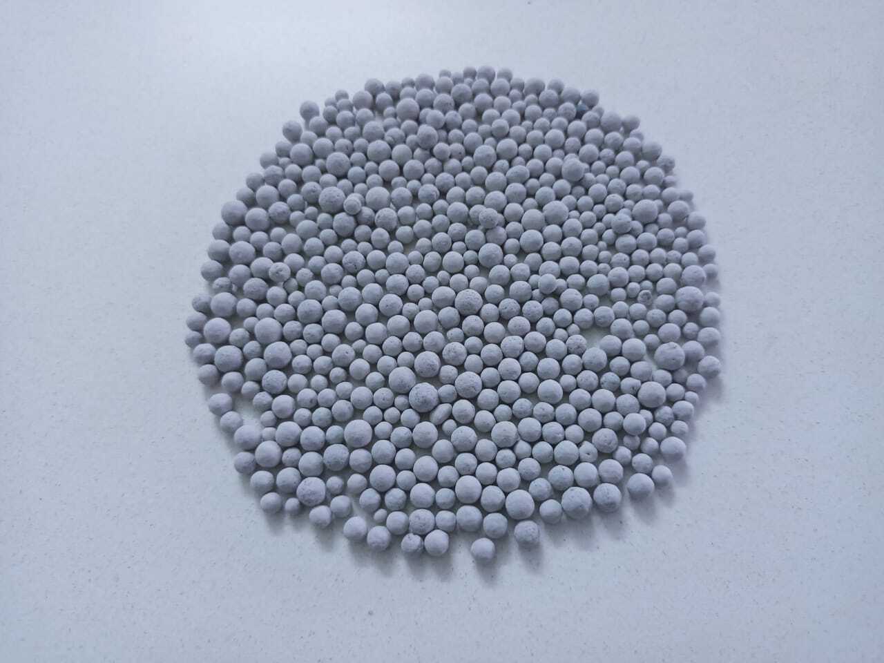 yellow color round shape bentonite granular for cat litter fertilizer roasted cat litter