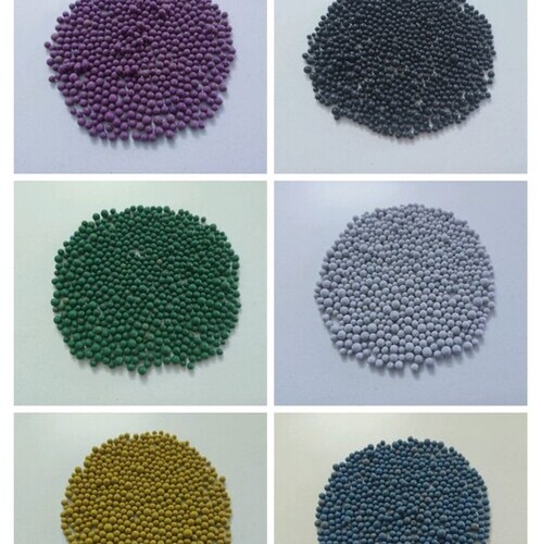 Multicolored coated bentonite granules for agricultural used