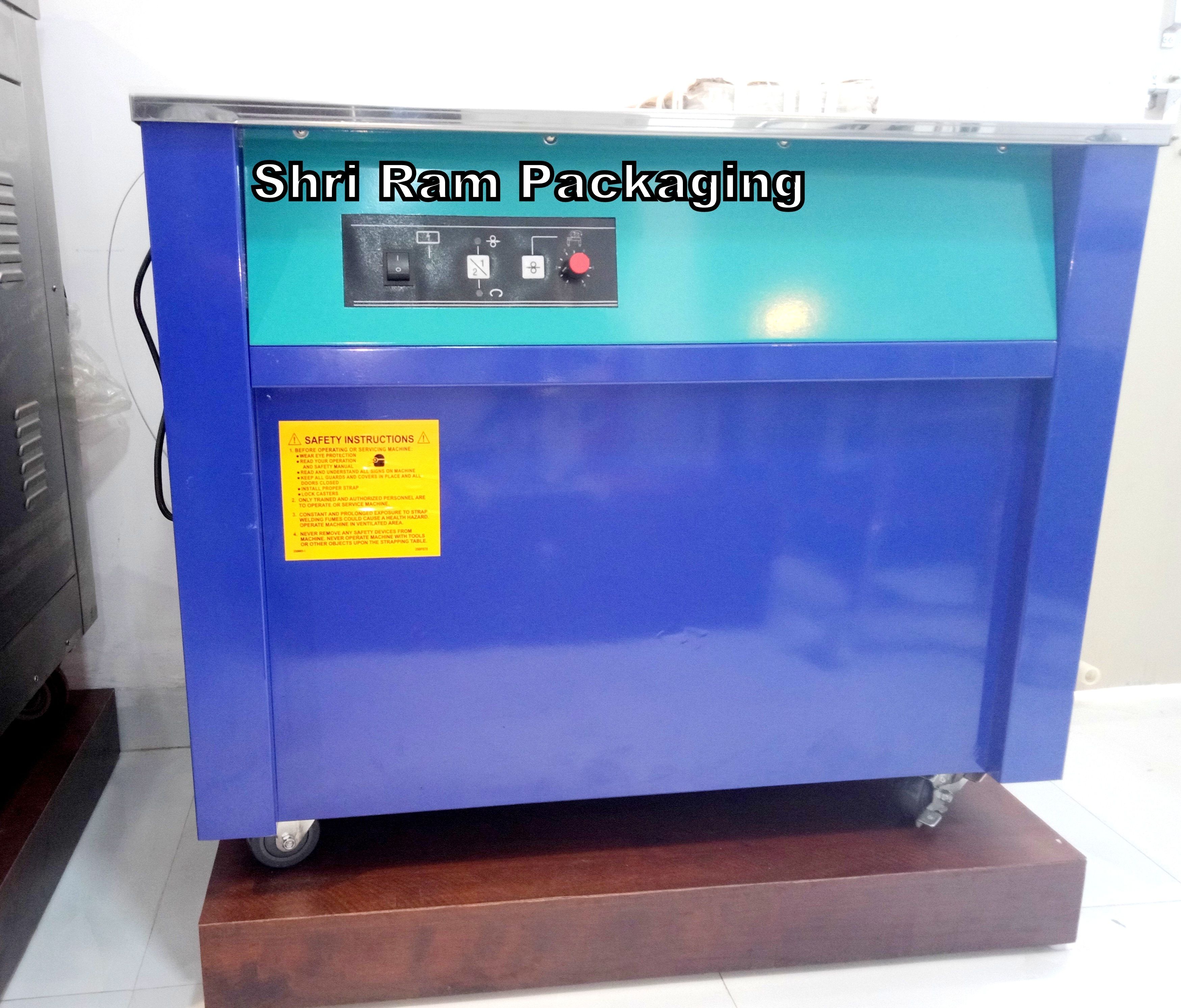 Box Strapping Machine