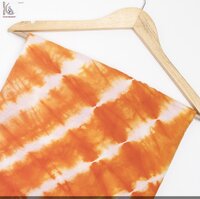 ORANGE TIE DYE FABRIC