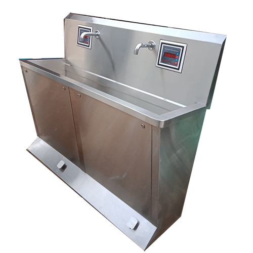 Automatic foot surgical sink