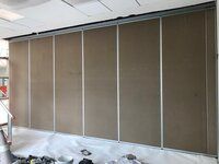 Sliding folding partition