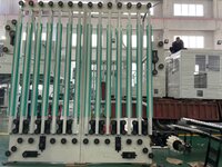 Accumulator for aluminum collapsible tubes making line