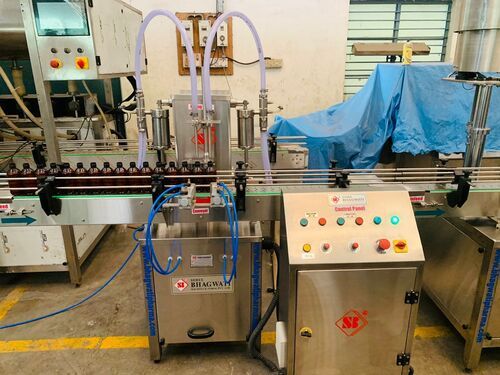 Automatic 2 head Volumetric Filling Machine