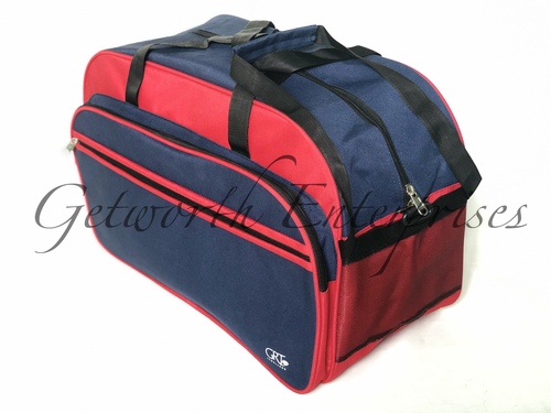 Blue with Red Complimentary Travel Bag - Material: Rexine, Size: 21" x 12" x 11", Color: Blue with Red | Features: Lightweight, Durable, Easy to Wash, Trendy Design