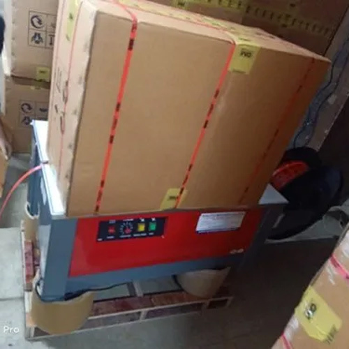 Box Strapping Machine