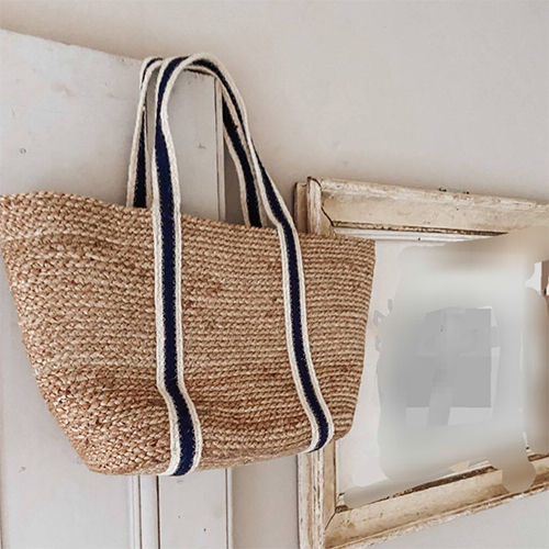 Handcrafted Jute Handbag with black and white handle