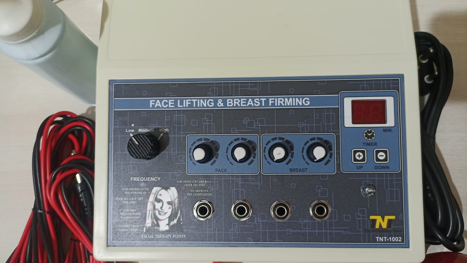 TNT Face Lifting Cum Breastfeeding Machine