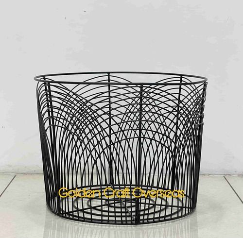 Stylish black laundry basket in iron with matte black powder coated finish