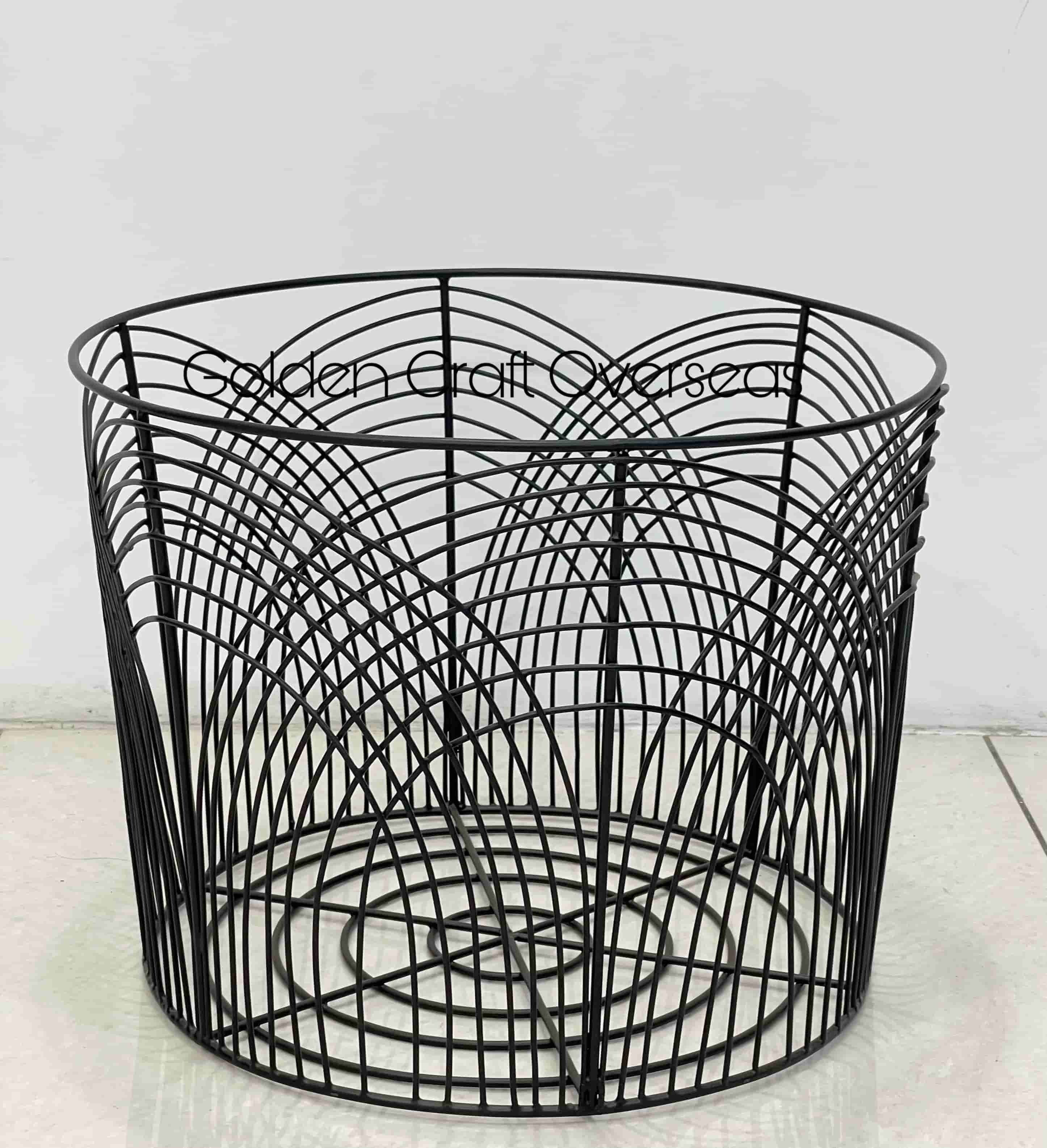 Stylish black laundry basket in iron with matte black powder coated finish