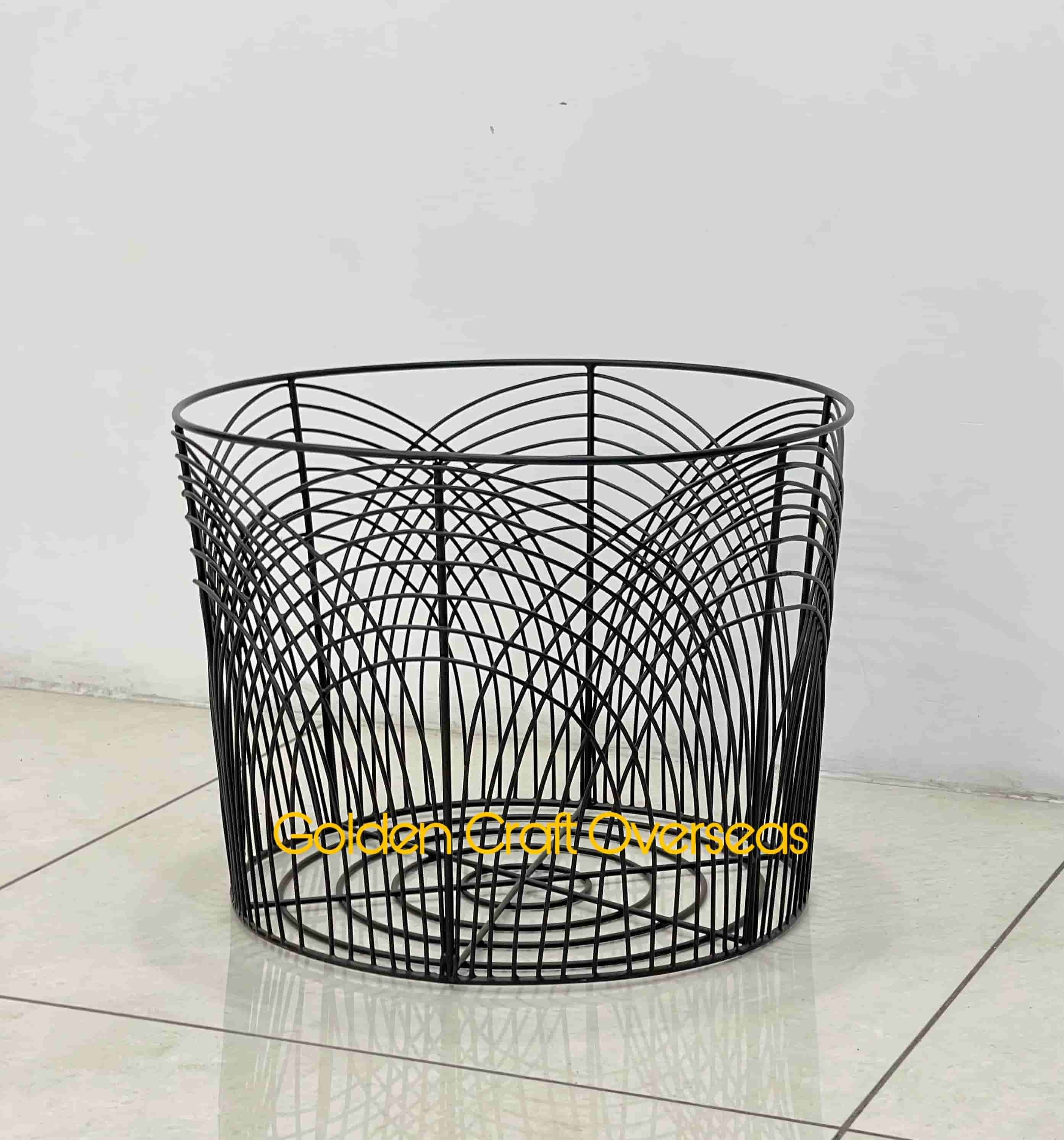 Stylish black laundry basket in iron with matte black powder coated finish