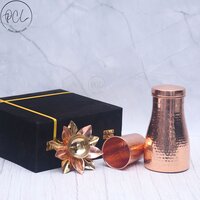 Exclusive Combo of Copper Bedroom Jar with Glass and Pooja Lotus Diya with Royal Gifting Box
