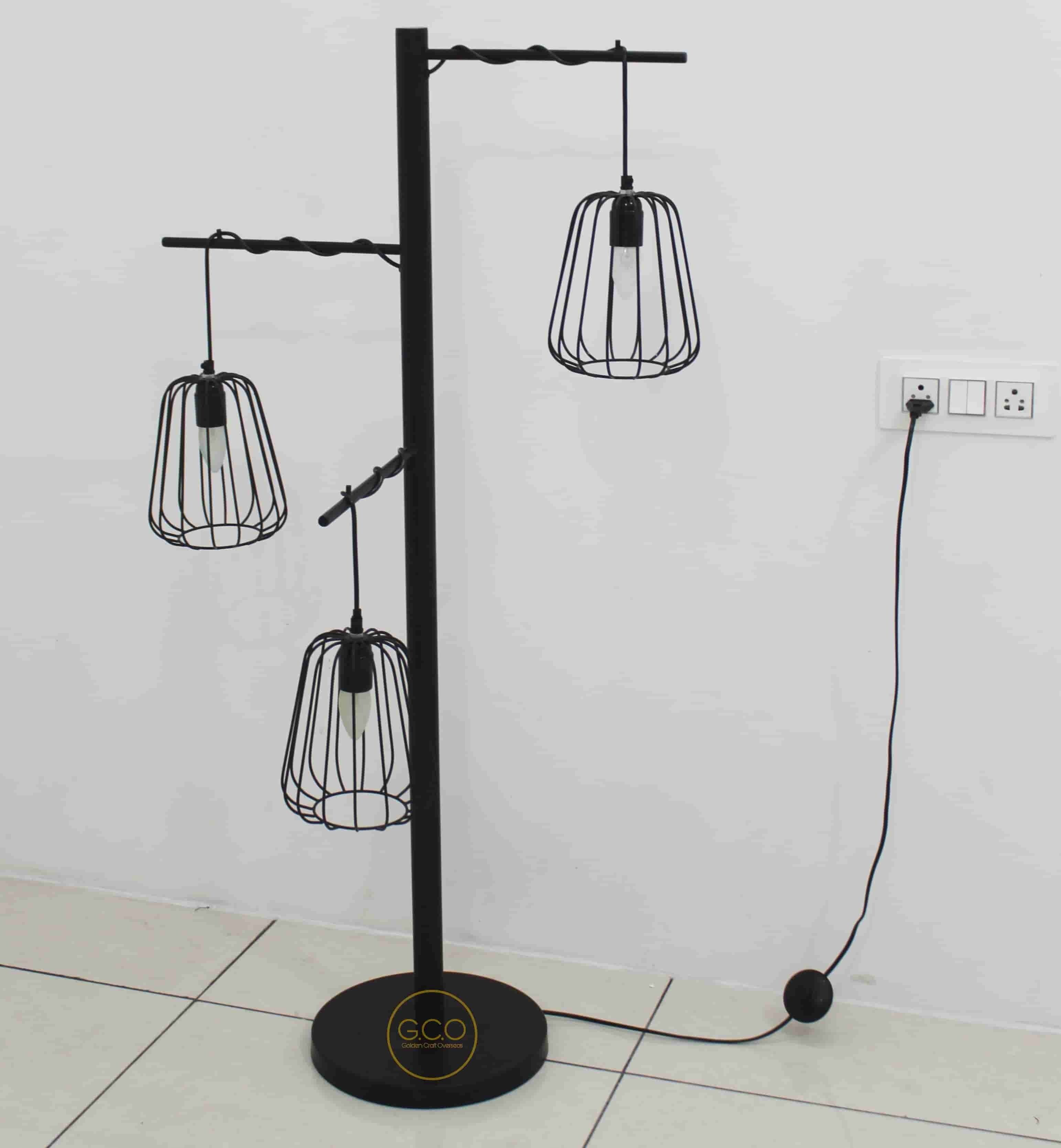 Three Arms Floor Lamp in iron with matte black powder coated finish for interior lighting