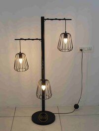 Three Arms Floor Lamp in iron with matte black powder coated finish for interior lighting