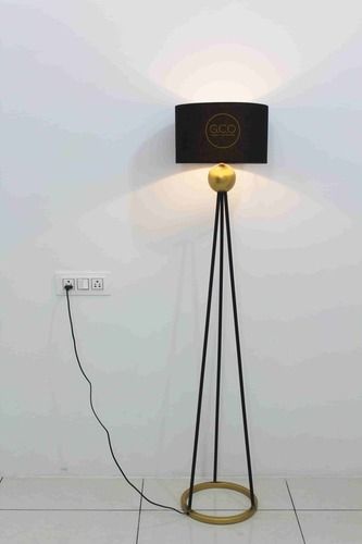 Black and gold floor lamp in modern contemporary design in iron with powder coated finish