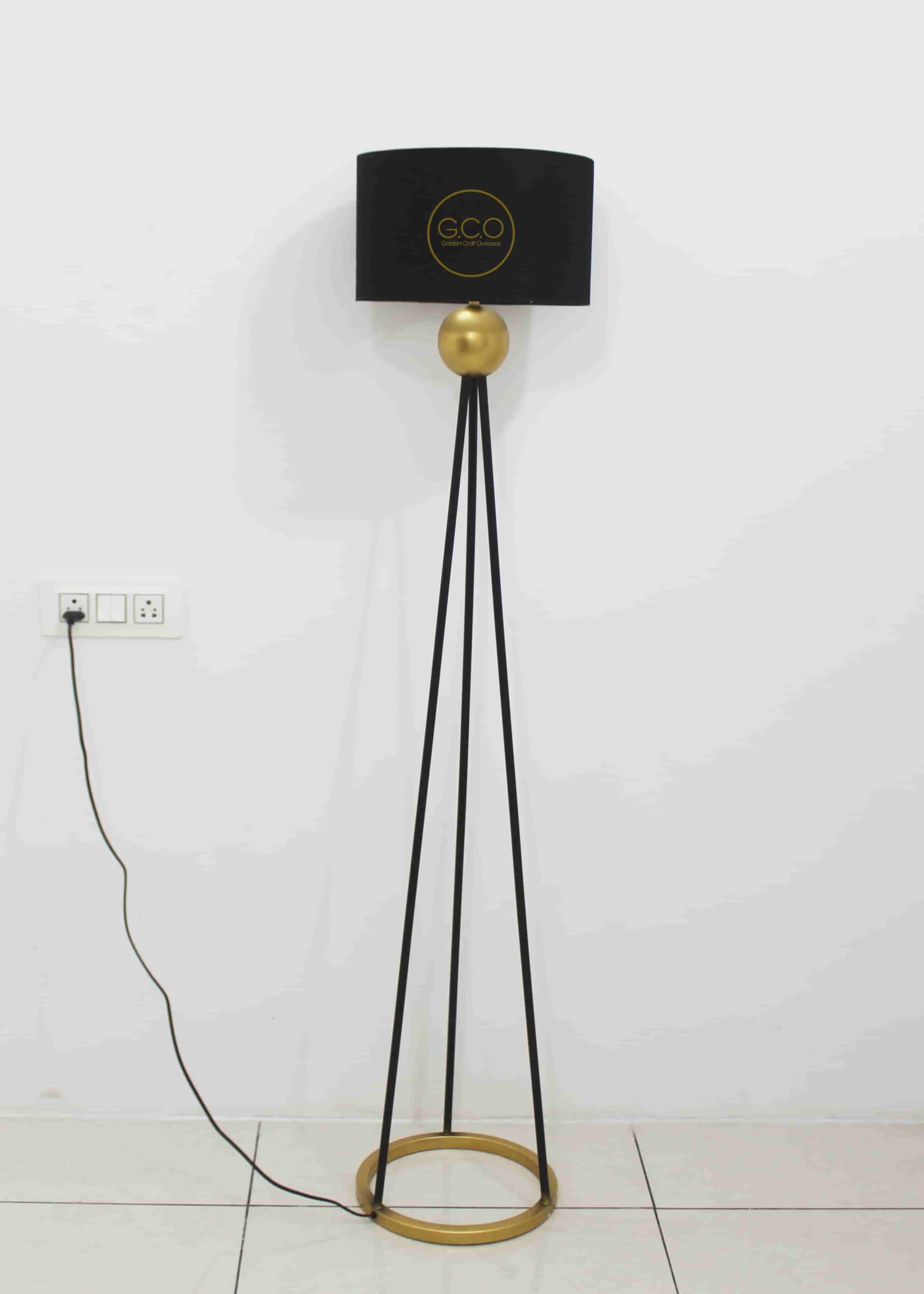 Black and gold floor lamp in modern contemporary design in iron with powder coated finish