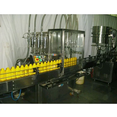 Silver Automatic 4 Nozzle Bottle And Jar Filling Machine